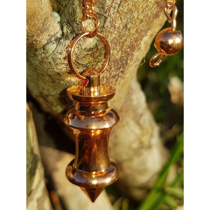 {
  "text": "Copper pendulum - 1"
}