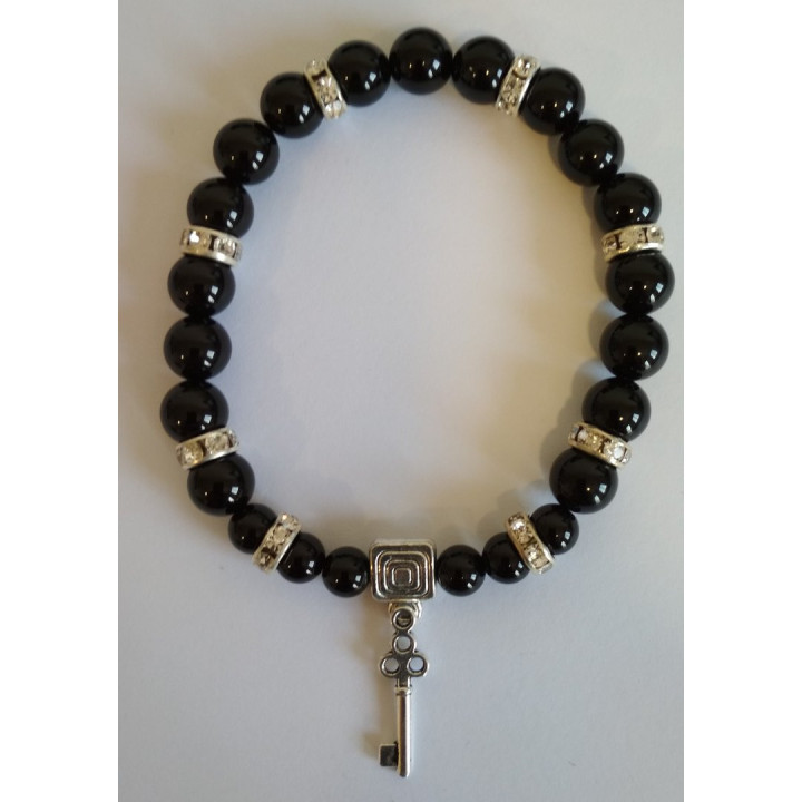 {
  "name": "BLACK TOURMALINE BRACELET AND Chave Abre Caminhos"
}