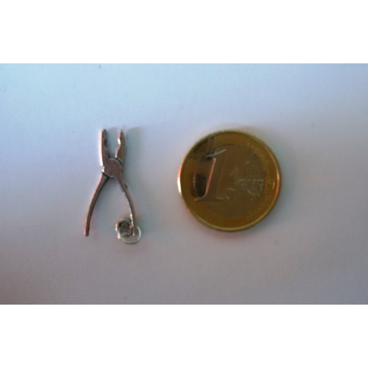 {
  "text": "Amulet - Working Tool"
}