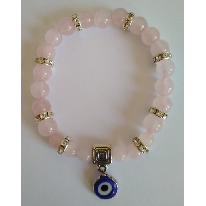 {
  "name": "Rose Quartz Bracelet with Turquoise Eye - Against Jealousy in Love"
}