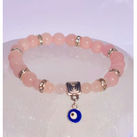 {
  "name": "Rose Quartz Bracelet with Turquoise Eye - Against Jealousy in Love"
}