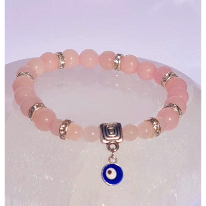 {
  "name": "Rose Quartz Bracelet with Turquoise Eye - Against Jealousy in Love"
}