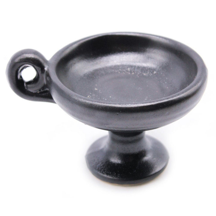 {
  "text": "Incense burner and smudge holder"
}